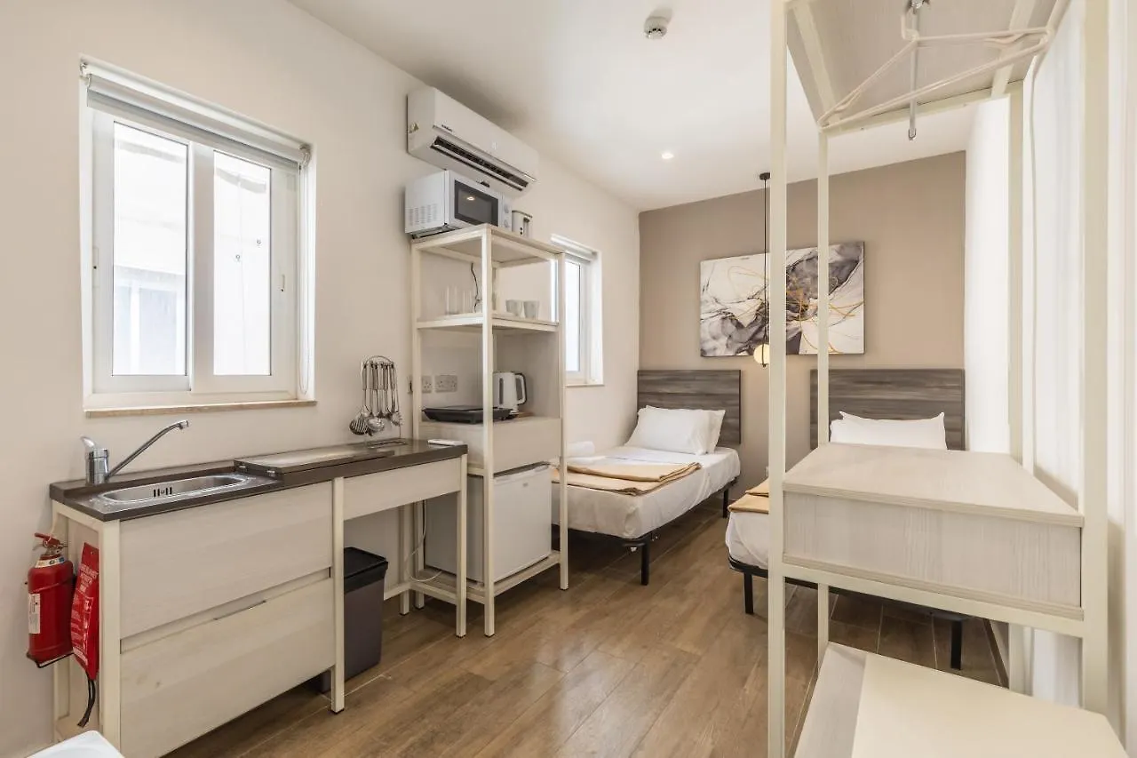 Studio Apartment With Twin Beds & Kitchenette At The New Olo Living 24 Saint Julian's