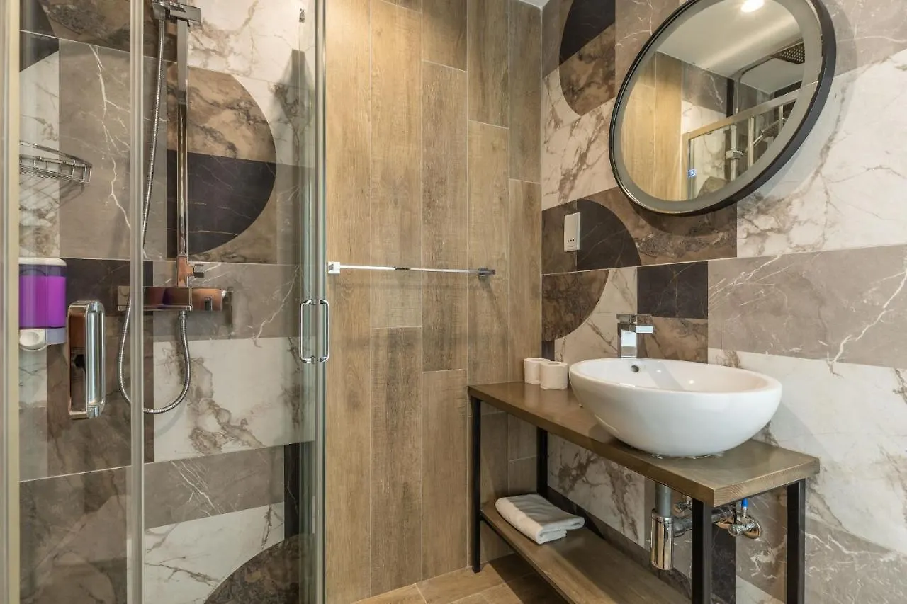 Studio Apartment With Twin Beds & Kitchenette At The New Olo Living 24 Saint Julian's